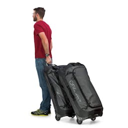 Osprey Transporter 120 Wheeled Dive Gear Duffel Bag Lifestyle in Motion Thumbnail}