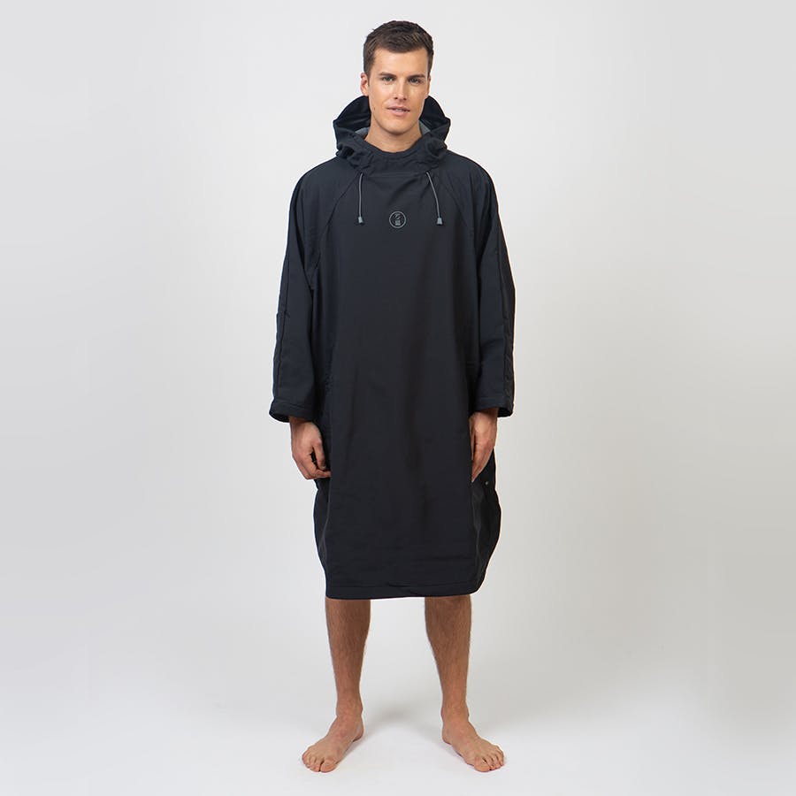 Fourth Element Storm Poncho Lifestyle on Man Front - Black