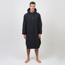 Fourth Element Storm Poncho Lifestyle on Man Front - Black Thumbnail}